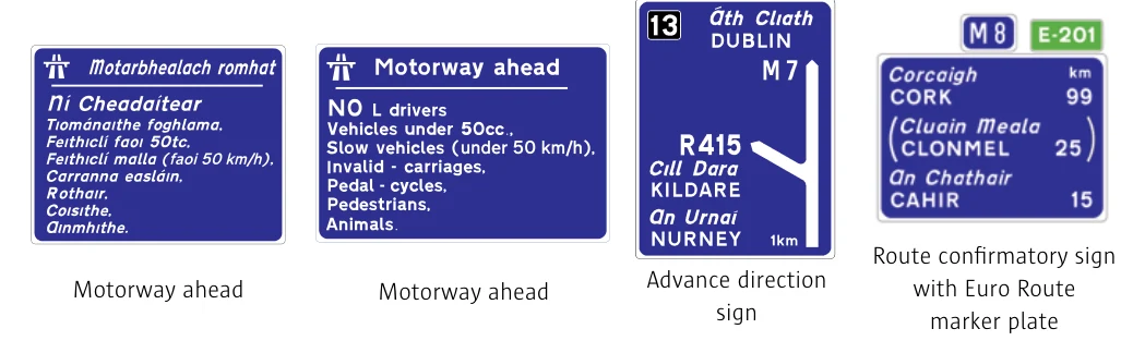 Blue motorway direction signs